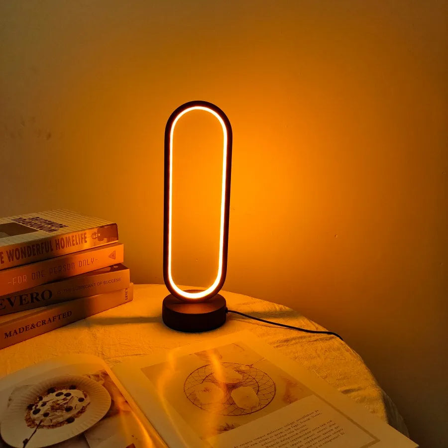 LED Ring Bedside Lamp – Elegance and Versatility for Any Room