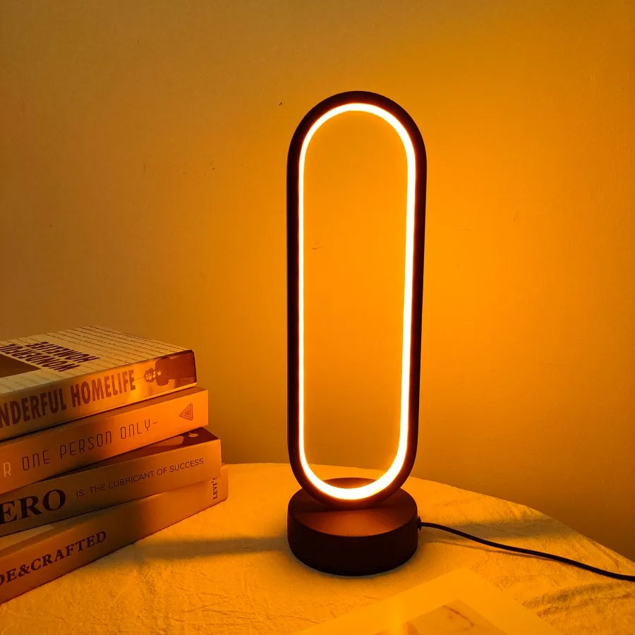 LED Ring Bedside Lamp – Elegance and Versatility for Any Room